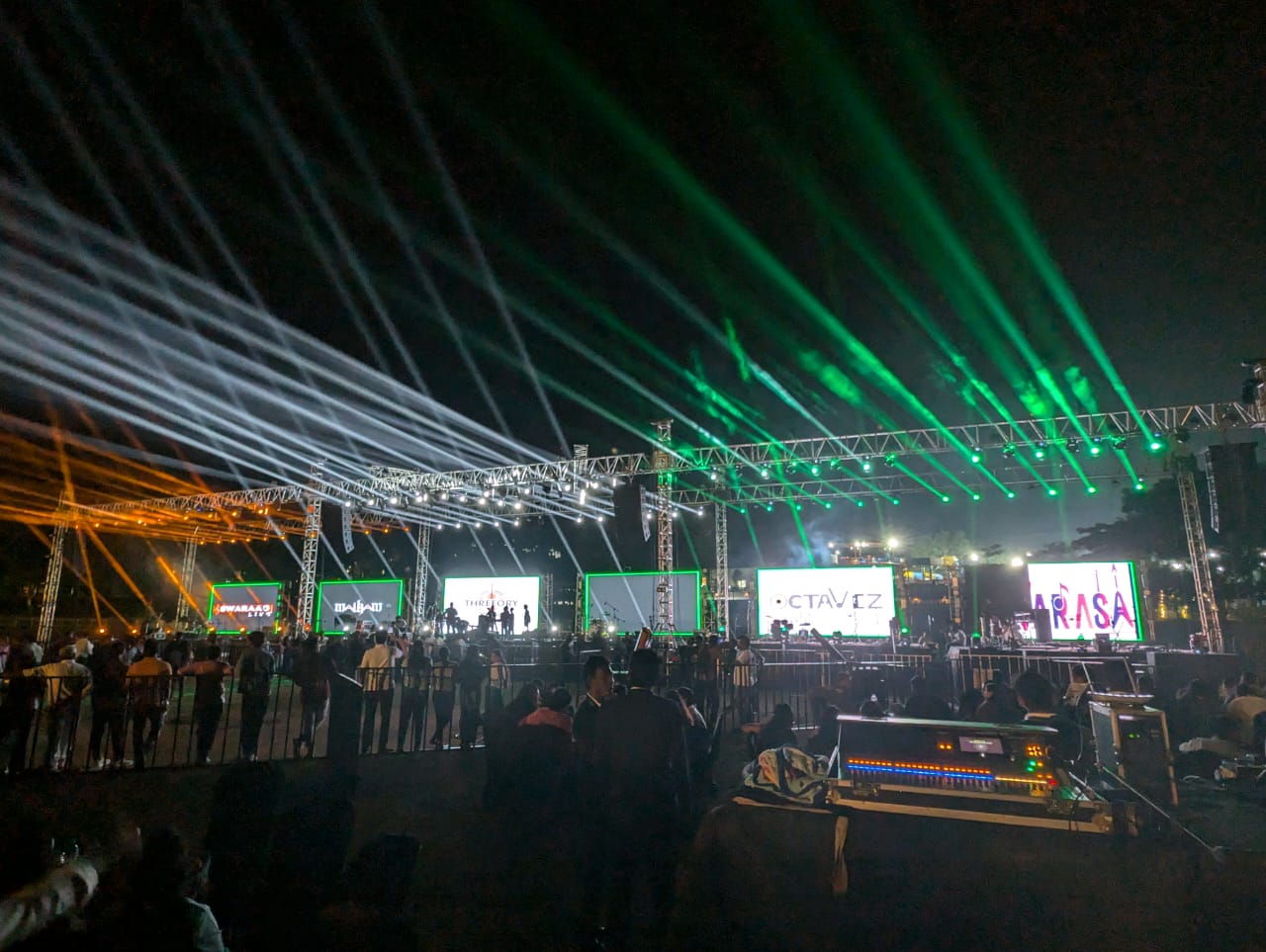 Festival stage with laser lights at night